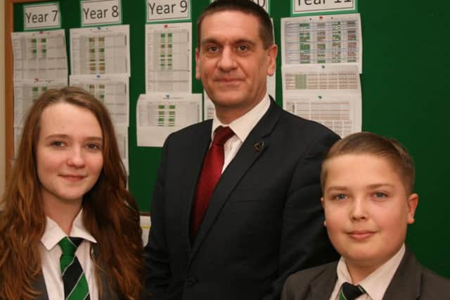 Holgate Mr Neil Holmes with students