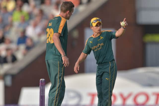 James Taylor and Jake Ball organise the fielding positions during the NatWest T20 Blast match between the Lightning and the Outlaws at Emirates Old Trafford, Manchester on 15 July 2015.  Photo: Simon Trafford