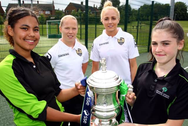 Notts County Ladies Players with the FA Cup at a training session at Samworth Academy, UK. 16th July 2015.