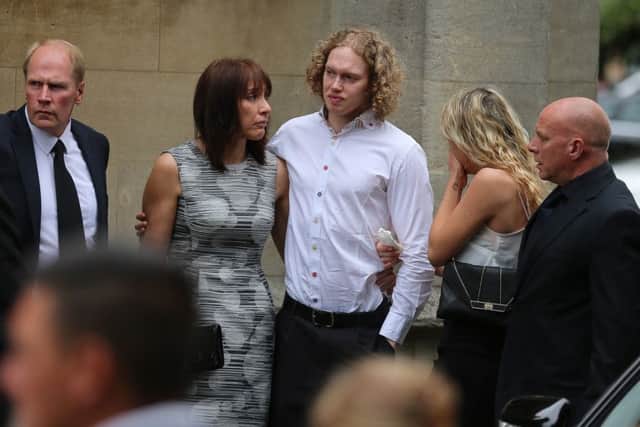 Fiance Liam Moore and Carly's close family arrive at the Church. The funeral of Carly Lovett, 24, at All Saints' Parish Church, Gainsborough today July 17 2015. Carly was one of 38 people killed in the Tunisian terrorist attack on June 26th at the coastal resort of Sousse. The 24-year-old was enjoying a holiday with fiance of six months Liam Moore who survived the attack. Tom Maddick / Rossparry.co.uk