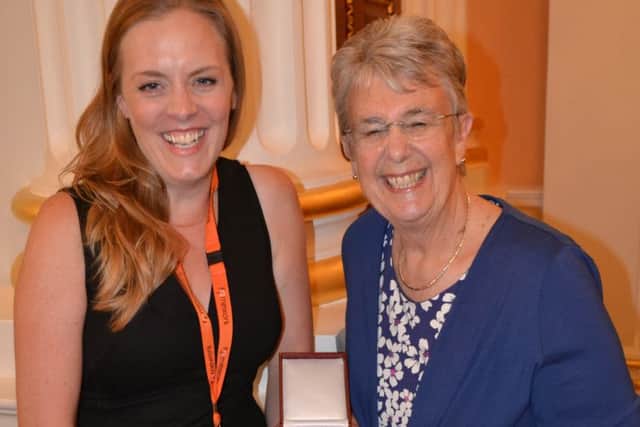 Pam Bishop, organiser of the Framework Big Snore challenge  has had her 10 years of service to the homeles charity recognised with a League of Mercy Award.Louise Darby, Framework Fundraising Manager on the left, Pam Bishop on the right.