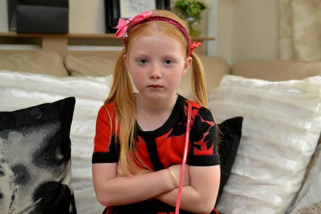 Chloe refused full attendance record at school for missing half a day due to concussion, Chloe, seven is pictured