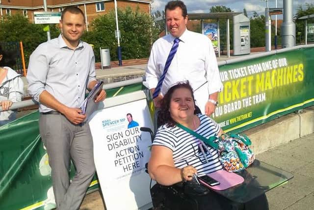 Emma Donaldson, of Hucknall who is campaigning for better disabled access at Kirkby Railway station, pictured with Sherwood MP Mark Spencer and Coun Ben Bradley.