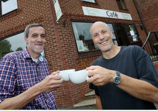 IN PICTURE: Martyn Swaby (corr) - Credit Union and Jeff Buck - Rumbletums, pictured at the Rumbletums Cafe in Kimberley.
STORY: NN LEAD: Rumbletums, a charity café dedicated to employing learning disabled youngsters, is working on creating a partnership with the Nottingham Credit Union.
PHOTOGRAPHER: MARK FEAR