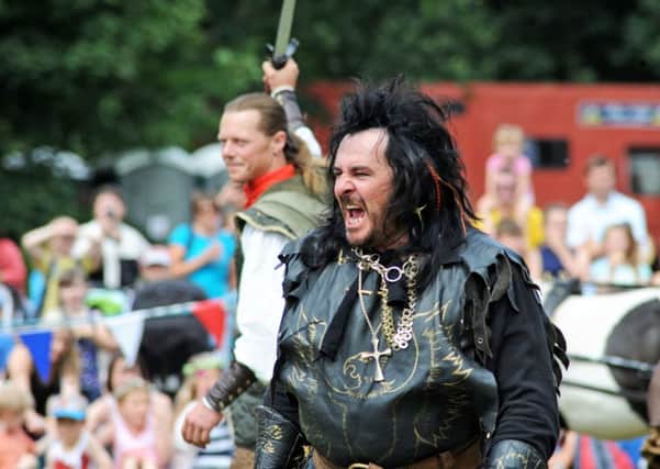 Robin Hood Festival launched.  
The Sheriff of Nottingham winds up the crowd at the opening ceremony.