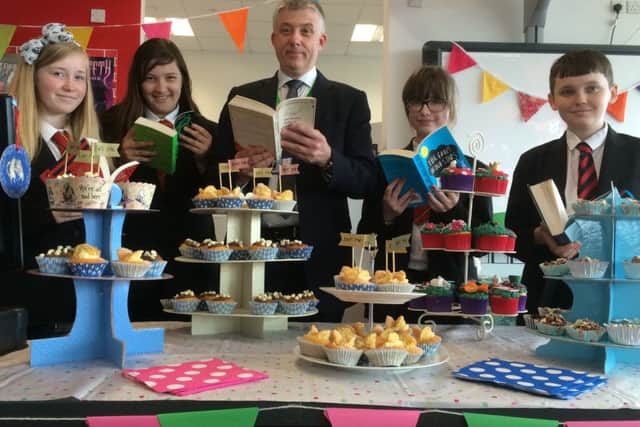 The Bulwell Academy's principal Paul Halcro with students at the Alice in Wonderland party