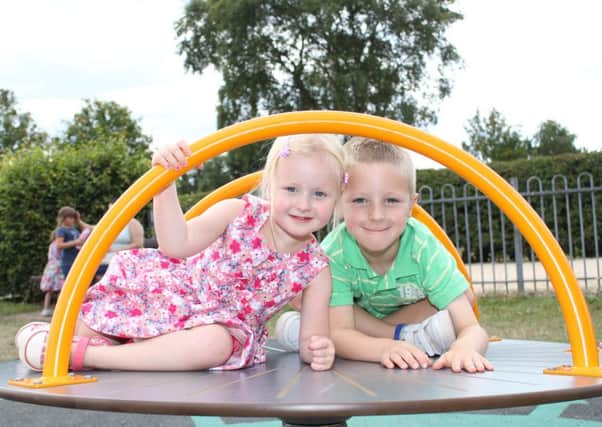 Harry and Evie Payne playing in King George V Park which has just been transformed by Mansfield Cistrict Council.