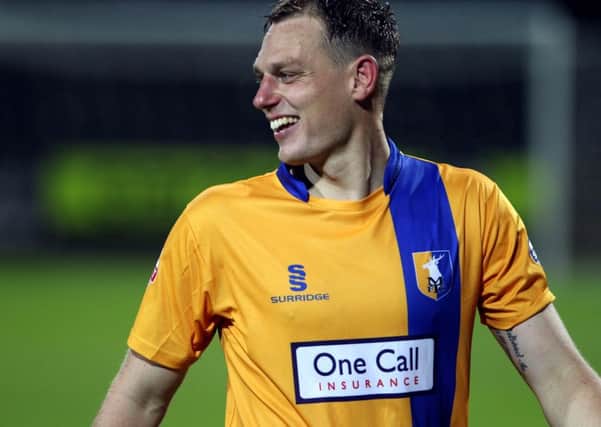Notts County v Mansfield Town
English League Football - Sky Bet League Two
Meadow Lane Stadium, Nottingham, England.
14th August 2015

Mansfield Town's Adam Chapman is all smiles as he leaves the pitch after the 2-0 win.

Picture by Dan Westwell