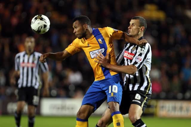 Notts County v Mansfield Town
English League Football - Sky Bet League Two
Meadow Lane Stadium, Nottingham, England.
14th August 2015
Mansfield Town's Matt Green tussles with Notts County's Haydn Hollis
Picture by Dan Westwell