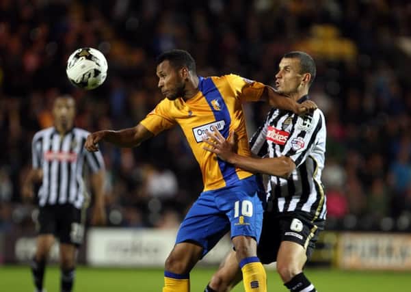 Notts County v Mansfield Town
English League Football - Sky Bet League Two
Meadow Lane Stadium, Nottingham, England.
14th August 2015

Mansfield Town's Matt Green tussles with Notts County's Haydn Hollis

Picture by Dan Westwell