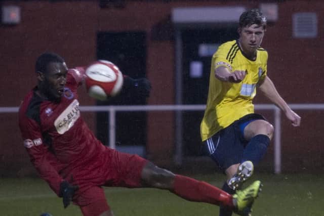 Worksop Town (yellow/blue v Stamford (red)- The Evo-Stik League Premier Division. Josh Williams