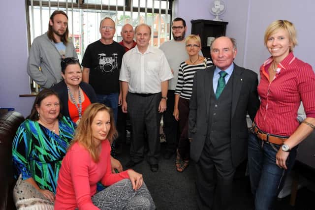 Nicci Robinson, (right) with Roger Garrett, charity steward, from the Provincial Grand Lodge of Nottinghamshire (second right) and members, workers and volunteers at MENding UK.