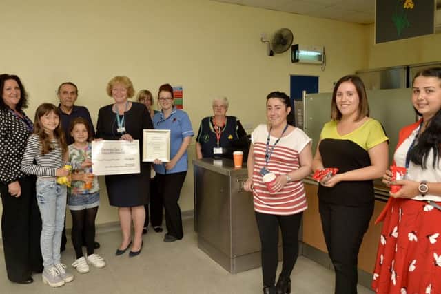 l Volunteers from the Daffodil café at King's Mill Hospital recently presented a cheque to Trust CEO Karen Fisher, donating a staggering £30,000 to the hospital's dementia care appeal.