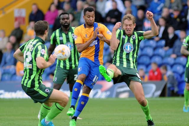 Mansfield Town v AFC Wimbledon -Skybet League One - One Call Stadium - Saturday 5th September 2015Matt Green gets blocked out by three defenders