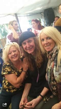 Popular Mansfield busker Ray Froggatt who has terminal cancer, at his musical fundraising day at The Star Mansfield Woodhouse. Ray is pictured with Maria Pleskauskas  from the Star Pub and  right, Jackie Else .
