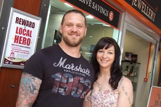 Phil Gray from Mansfield who won the local hero award at Idlewells Shopping Centre in Sutton. He is pictured with fiance, Stephanie Coles