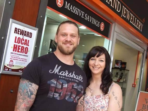 Phil Gray from Mansfield who won the local hero award at Idlewells Shopping Centre in Sutton. He is pictured with fiance, Stephanie Coles