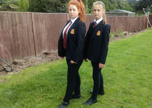 Dukeries Academy pupils Kaylee and Shannon Sheppard were sent home for wearing skinny fit trousers.
