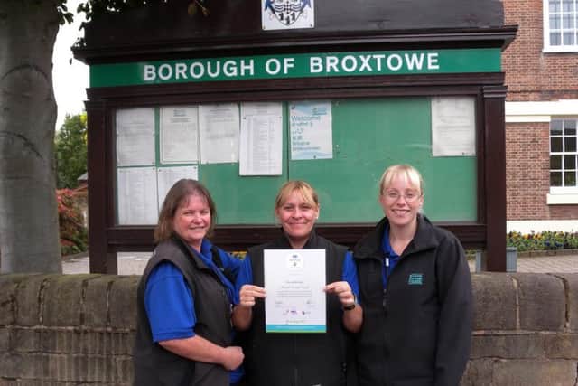 Broxtowe Borough Neighbourhood Wardens Kathryn Trevor, Deborah Duckworth and Kelly Storey with their certificate for supporting stray dogs