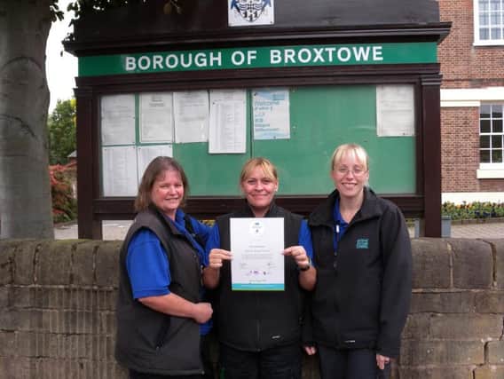 Broxtowe Borough Neighbourhood Wardens Kathryn Trevor, Deborah Duckworth and Kelly Storey with their certificate for supporting stray dogs