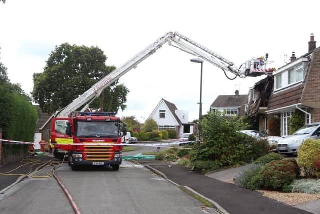 The scene of the house explosion on Sunday.