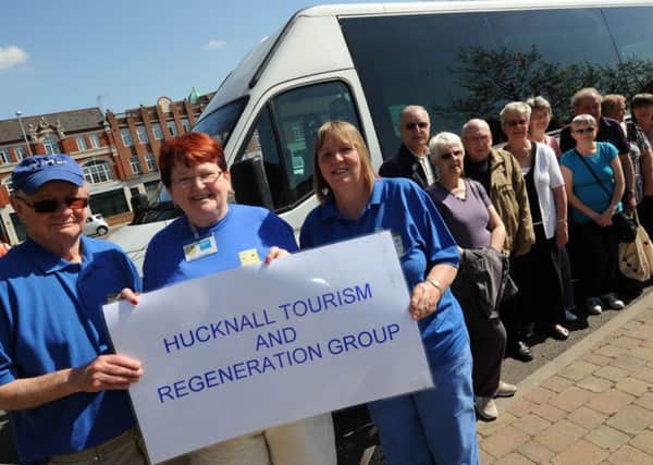 free bus tour for Hucknall Tourism and Regeneration Group (HTRG). Pictured front l-r is Pat Richards tour guide, Sheila Robinson organiser and Kathy Williams escort.