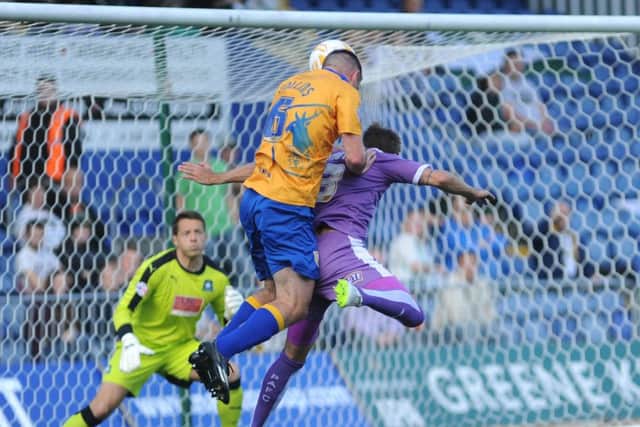Mansfield Town v Plymouth -Skybet League One - One Call Stadium - Saturday 26th September 2015
Lee Collins wins an aerial battle