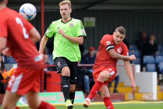 Alfreton Town v Stalybridge Celtic.
Joe Leesley tries a shot at goal in the first half.