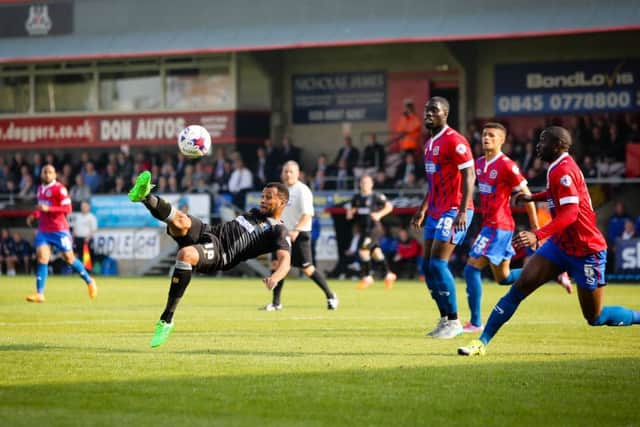 Match action between Mansfield Town and Dagenham and Redbridge (Pic: Chris Holloway, Bluewheel)