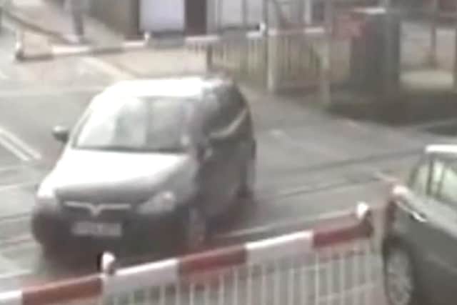 A car stuck on a level crossing in Leicestershire