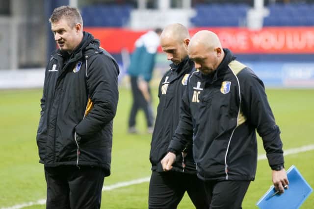 Micky Moore, Adam Murray and Richard Cooper.