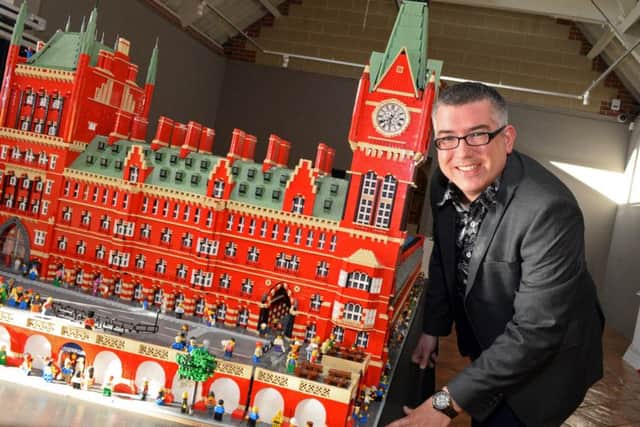 Lego Masterbuider Warren Elsmore pictured by his St. Pancras Station creation, which took over two years to make and includes over 150,000 lego pieces. Picture: Marie Caley NWGU Lego MC 8