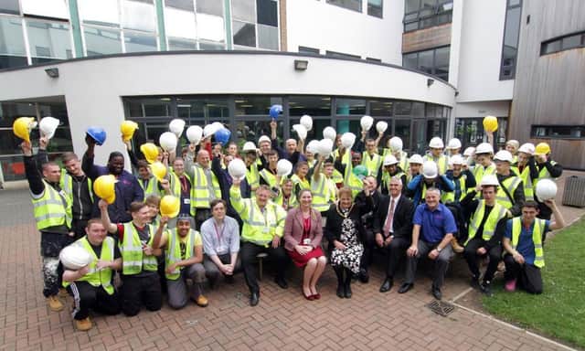 Mayor of the Borough of Broxtowe, Councillor Susan Bagshaw joins representatives from the Council, United Living and Central College along with construction students who will take part in the work experience programme.