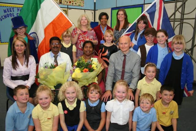 Awsworth Primary and Nursery School hosted teachers from India. 
Pictures: The special guests seated centre. with Mrs.Mainprize (seated left) and Mr.Baxter with staff pupils and supporters at the special assembly.