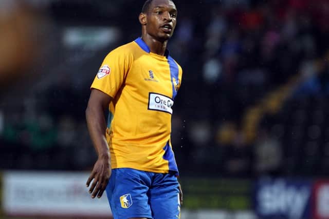 Mansfield Town's Krystian Pearce completes his suspension on Saturday. Picture by Dan Westwell