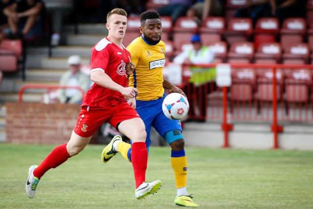Adi Yussuf chases the ball