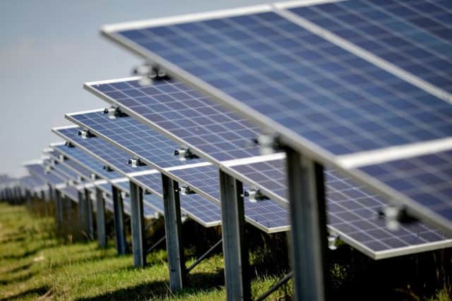 Solar panels on an existing solar farm.