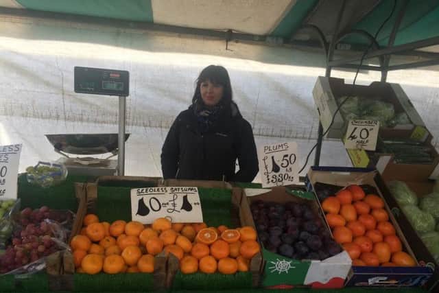 Rebecca Favill works on Favill's Fruit and Veg on Mansfield market