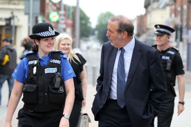 Nottinghamshire Police and Crime Commissioner Paddy Tipping on a walkabout around Kirkby. Paddy is pictured with PCSO Madeleine Sefton.
