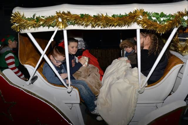 Santa paid a surprise visit to Toby and Grace McCran aged eight and three in a horse drawn sleigh