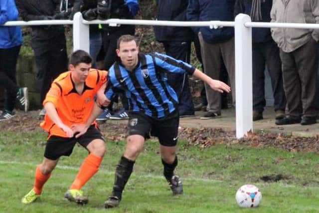 Selstons Jamie Renshaw takes control.