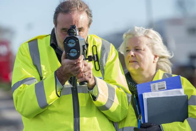 June Stendall with Nottinghamshire Police Commissioner Paddy Tipping getting involved in the SpeedWatch scheme on Sutton Road, Mansfield Woodhouse.