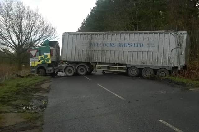 A lorry tried to turn around on Netherfield Lane in Mansfield and got stuck in a ditch causing the road to be blocked