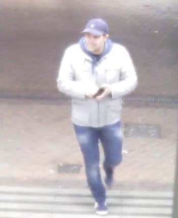 Nottinghamshire Police want to speak with this man in connection with a robbery in Mansfield Woodhouse on 18 November 2015