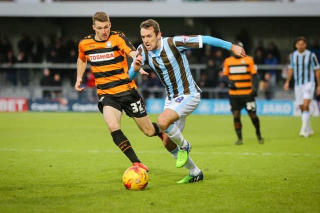 Mansfield Town's Blair Adams breaks through the Barnet defence - Pic Chris Holloway