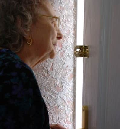 Dorothy Slingsby from Manor Park takes precautions against bogus callers and burglars