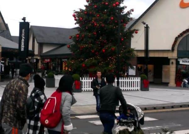 Shoppers hunt for bargains at McArthurGlen East Midlands Designer Outlet.