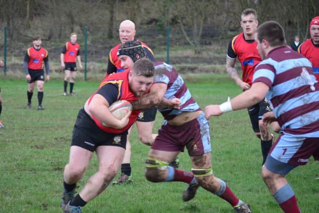 CAPTAIN MARVEL -- Ashfield skipper Chris Houseman leads by example in the victory against Ashby.