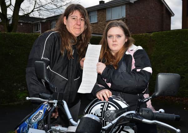 Parking ticket row, pictured is Chloe Porter with her parking ticket with Michelle Oliver