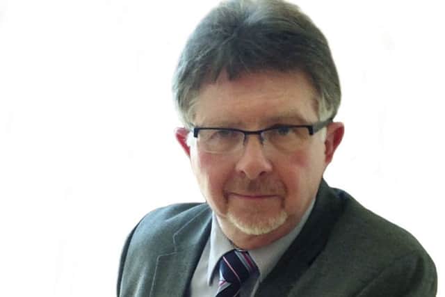 Coun Alan Rhodes